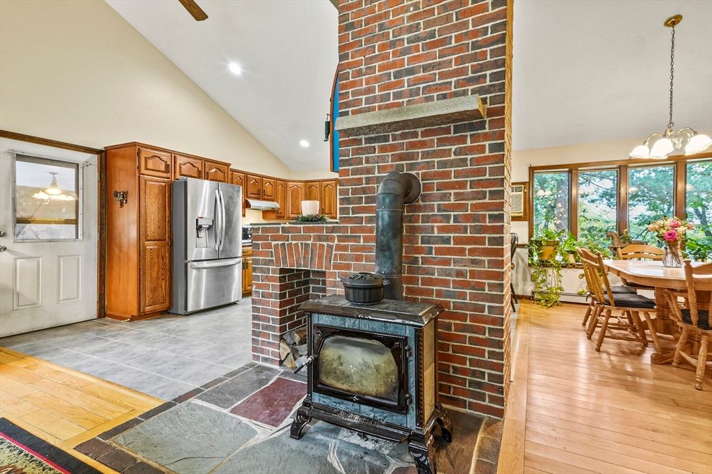 Dining room, Fireplace, Interior, Kitchen, Pendant Lights, Recessed Lighting, Stone Walls, Wood Texture Flooring
