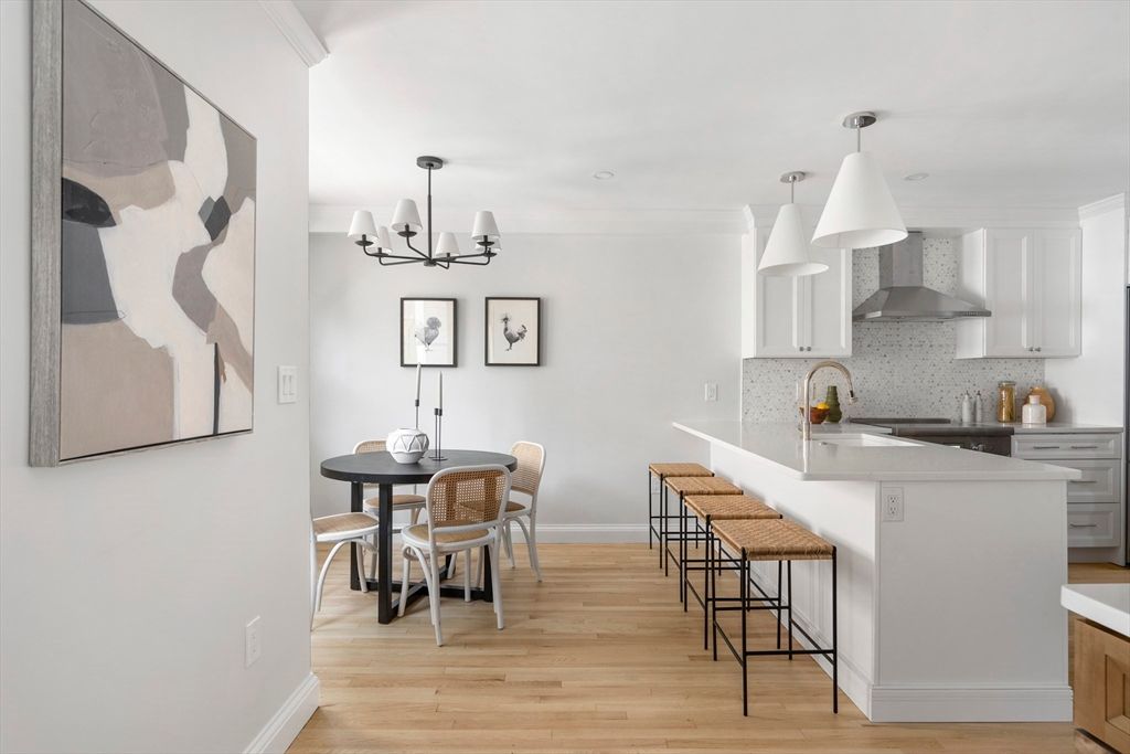 Chandelier, Dining room, Interior, Kitchen, Pendant Lights, Stainless Steel Appliances, Wood Texture Flooring