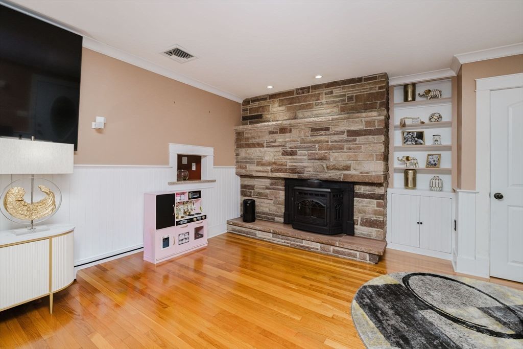 Fireplace, Interior, Recessed Lighting, Stone Walls, Wood Texture Flooring
