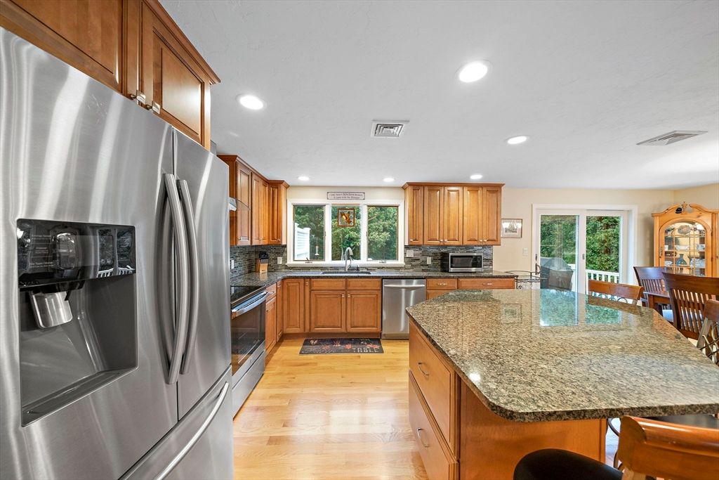 Dining room, Interior, Kitchen, Recessed Lighting, Stainless Steel Appliances, Wood Texture Flooring