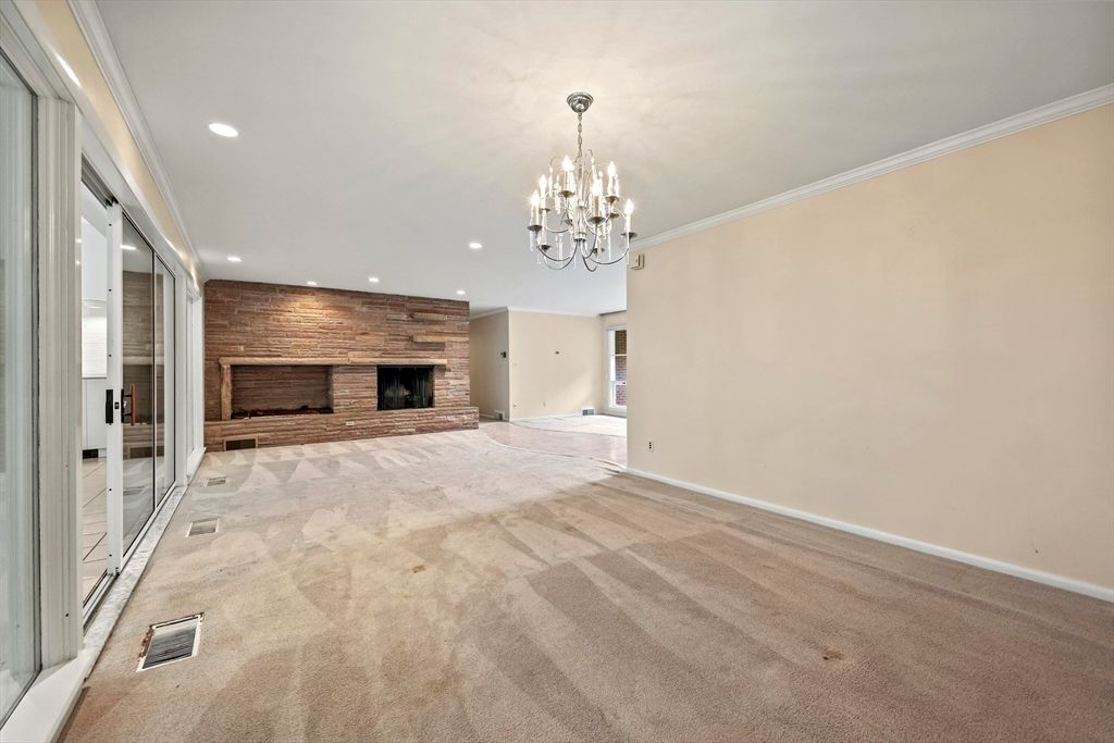 Chandelier, Empty room, Fireplace, Interior, Recessed Lighting, Stone Walls
