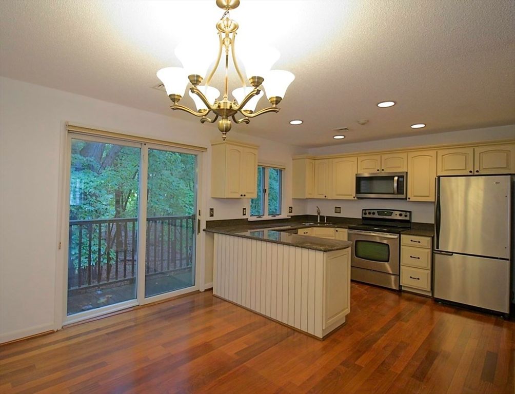 Chandelier, Interior, Kitchen, Recessed Lighting, Stainless Steel Appliances, Wood Texture Flooring