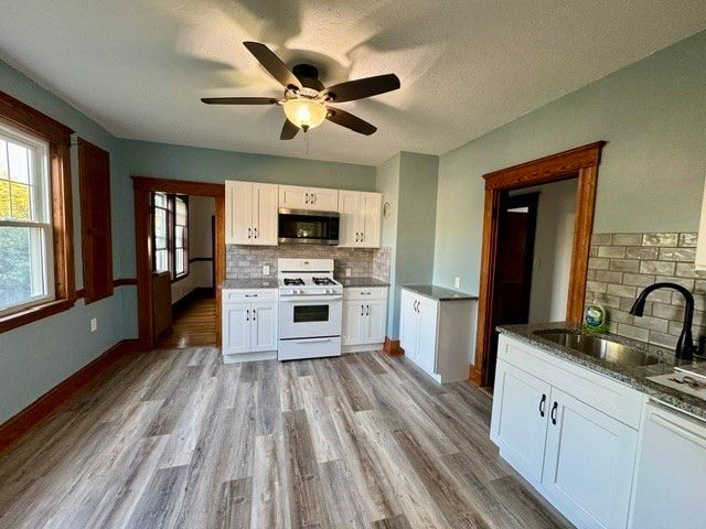 Interior, Kitchen, Stainless Steel Appliances, Stone Walls, Wood Texture Flooring