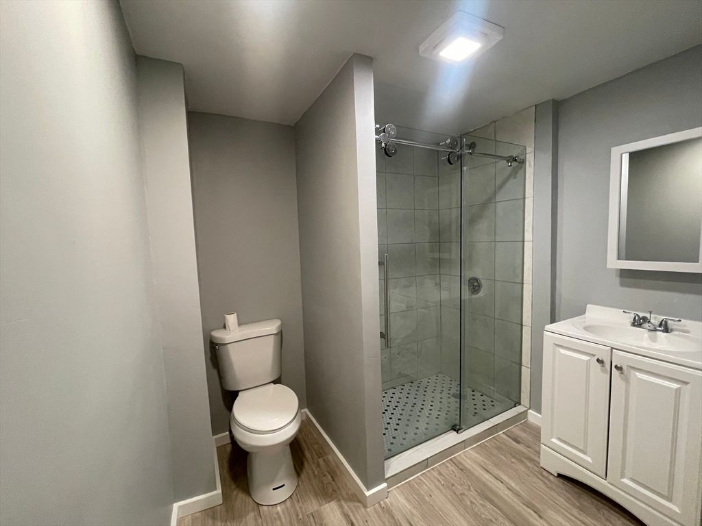 Bathroom, Glass Shower, Interior, Recessed Lighting, Wood Texture Flooring