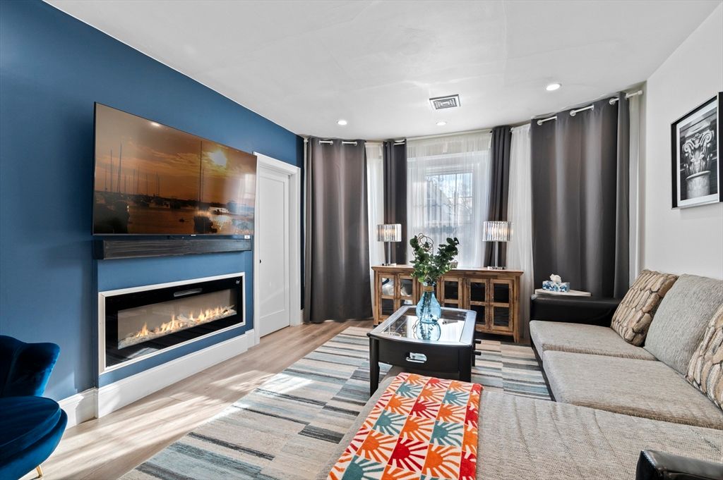 Fireplace, Interior, Living room, Recessed Lighting, Wood Texture Flooring
