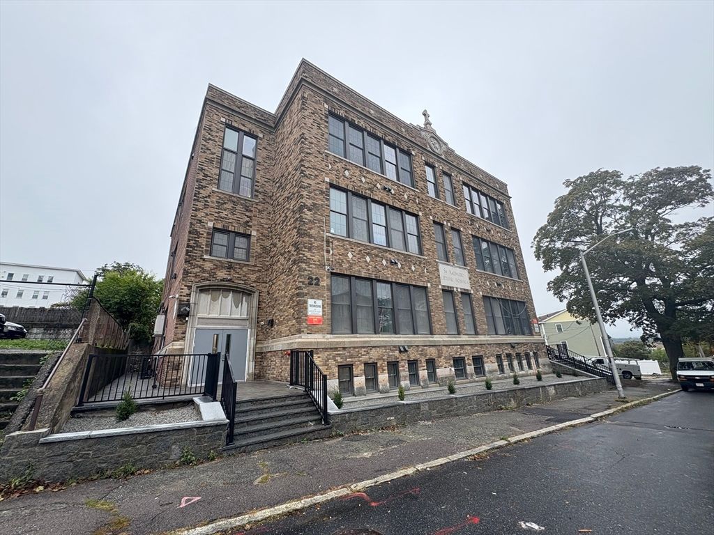 Exterior, Facade, Brick Facade, Condo Building