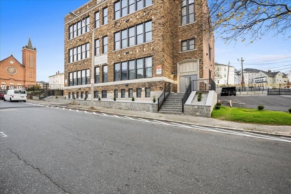 Exterior, Facade, Brick Facade, Condo Building