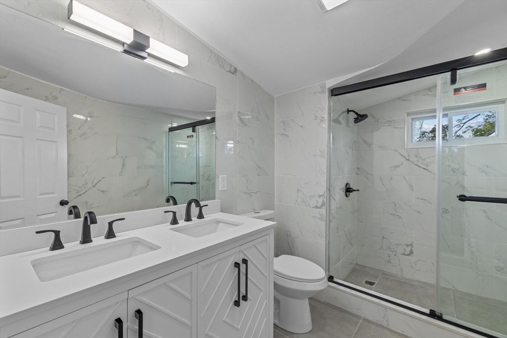 Bathroom, Dual Sink Vanities, Glass Shower, Interior, Marble Walls