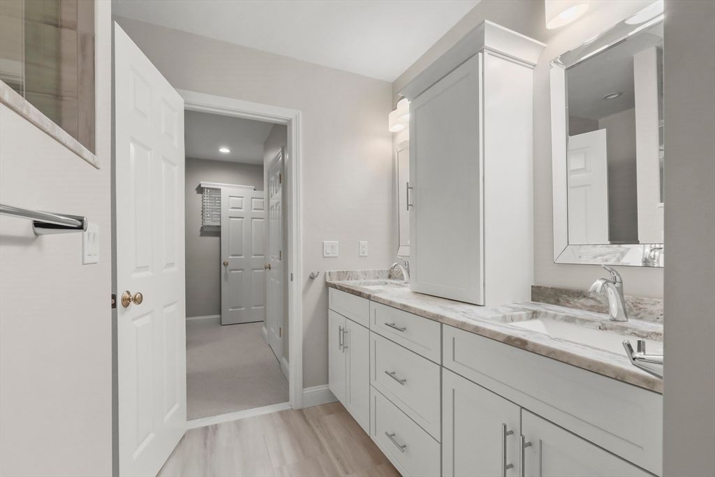 Bathroom, Dual Sink Vanities, Interior, Recessed Lighting, Wood Texture Flooring