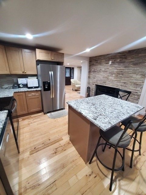 Interior, Kitchen, Recessed Lighting, Stainless Steel Appliances, Stone Walls, Wood Texture Flooring
