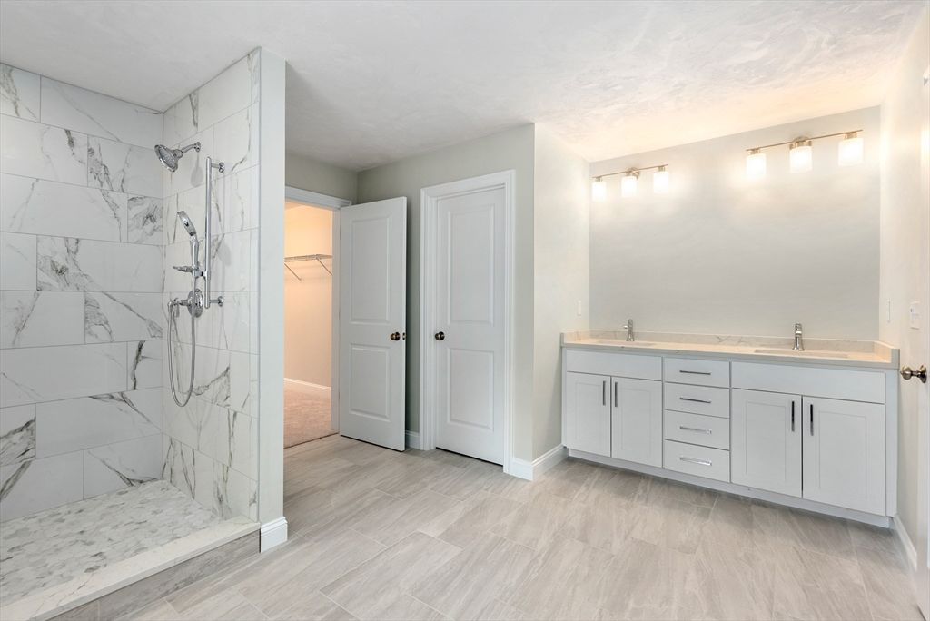 Bathroom, Dual Sink Vanities, Glass Shower, Interior, Marble Walls