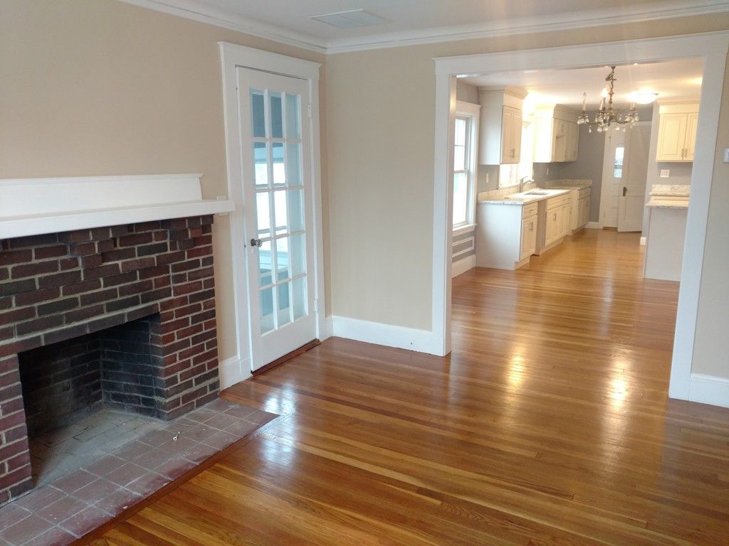 Chandelier, Empty room, Fireplace, Interior, Kitchen, Pendant Lights, Wood Texture Flooring