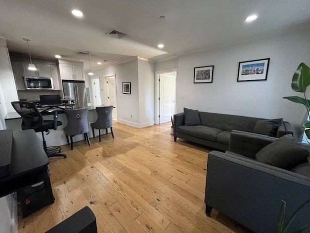 Dining room, Interior, Kitchen, Living room, Pendant Lights, Recessed Lighting, Stainless Steel Appliances, Wood Texture Flooring