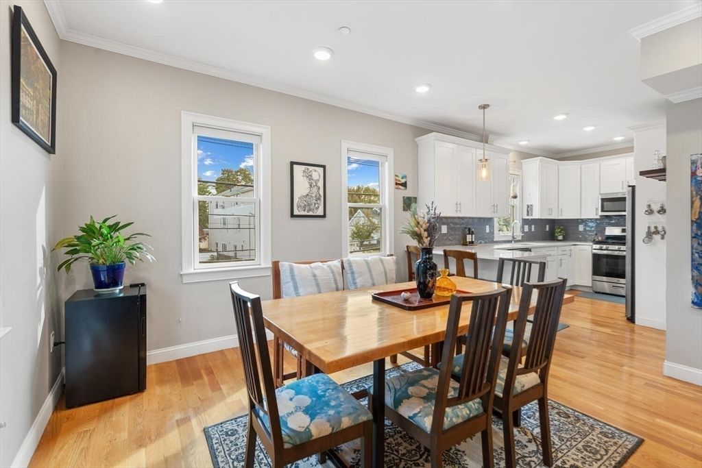 Dining room, Interior, Kitchen, Pendant Lights, Recessed Lighting, Stainless Steel Appliances, Wood Texture Flooring