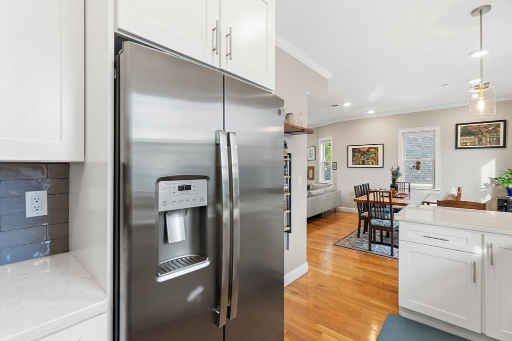 Dining room, Interior, Kitchen, Pendant Lights, Recessed Lighting, Stainless Steel Appliances, Wood Texture Flooring