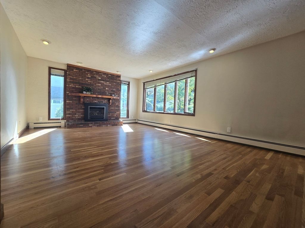 Empty room, Fireplace, Interior, Recessed Lighting, Wood Texture Flooring