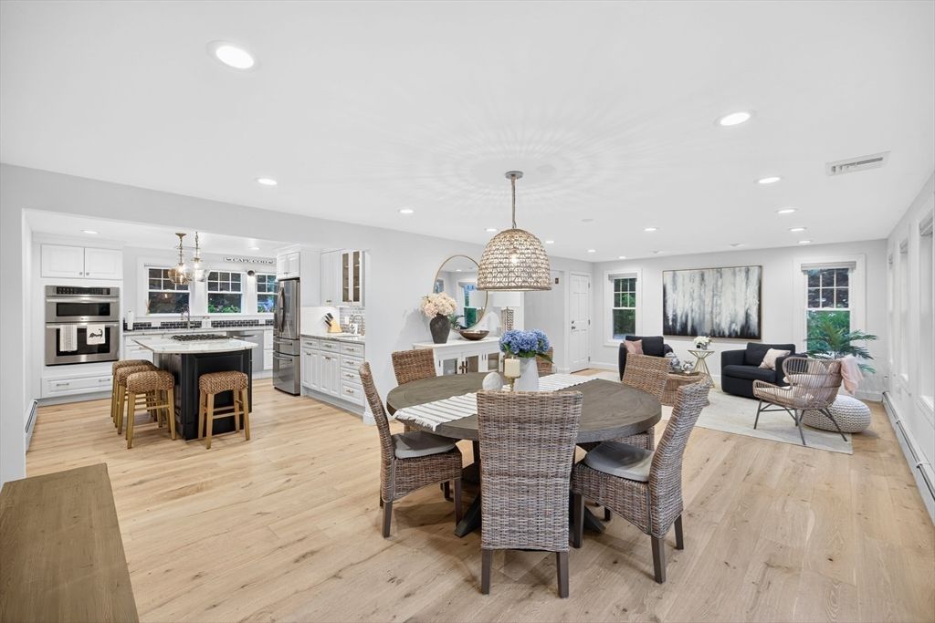 Dining room, Interior, Kitchen, Living room, Pendant Lights, Recessed Lighting, Stainless Steel Appliances, Wood Texture Flooring