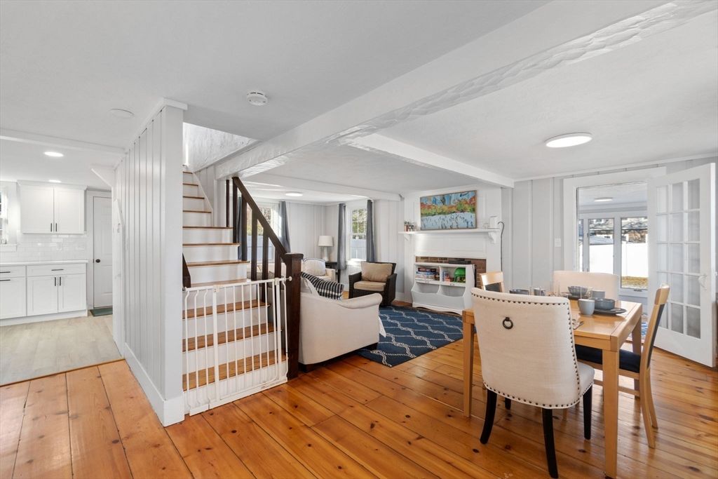Dining room, Fireplace, Interior, Living room, Recessed Lighting, Wood Texture Flooring