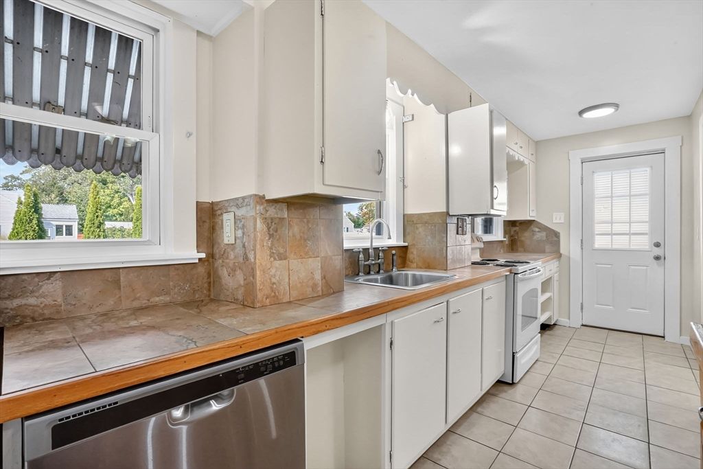 Interior, Kitchen, Recessed Lighting, Stainless Steel Appliances, Tile Countertops