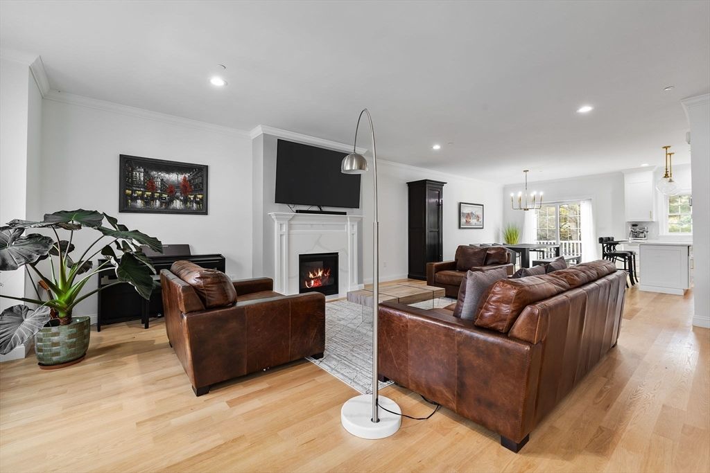 Dining room, Fireplace, Interior, Living room, Pendant Lights, Recessed Lighting, Wood Texture Flooring