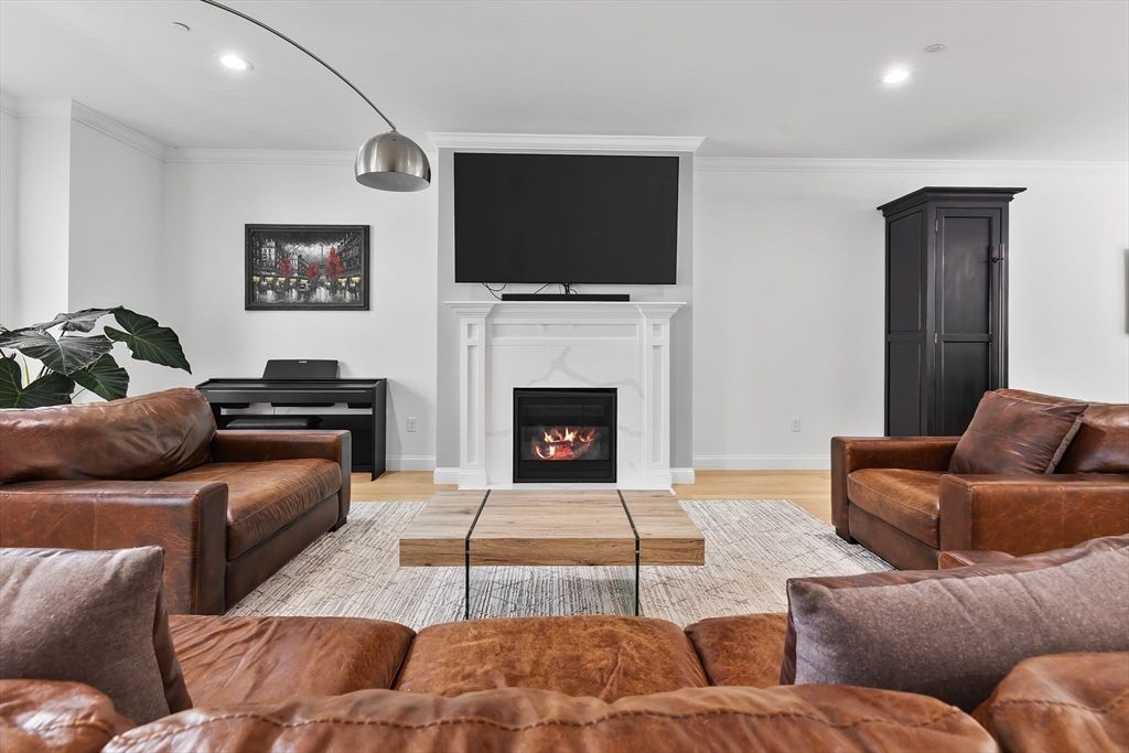 Fireplace, Interior, Living room, Piano, Recessed Lighting, Wood Texture Flooring