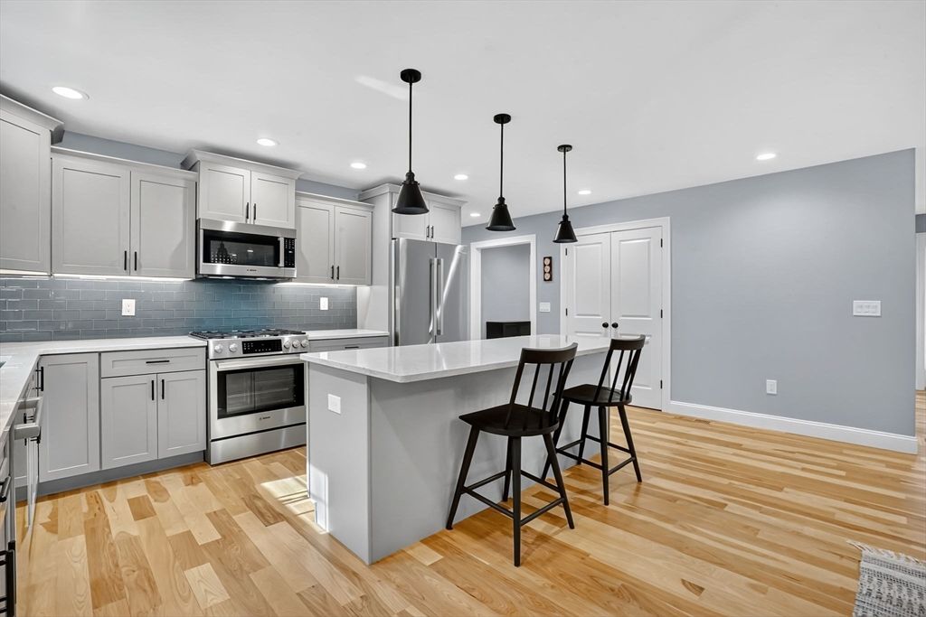 Interior, Kitchen, Pendant Lights, Recessed Lighting, Stainless Steel Appliances, Wood Texture Flooring