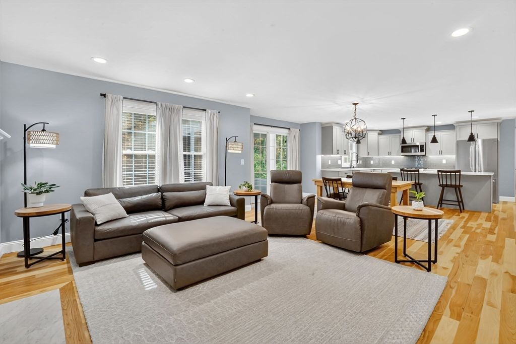 Chandelier, Dining room, Interior, Kitchen, Living room, Pendant Lights, Recessed Lighting, Stainless Steel Appliances, Wood Texture Flooring