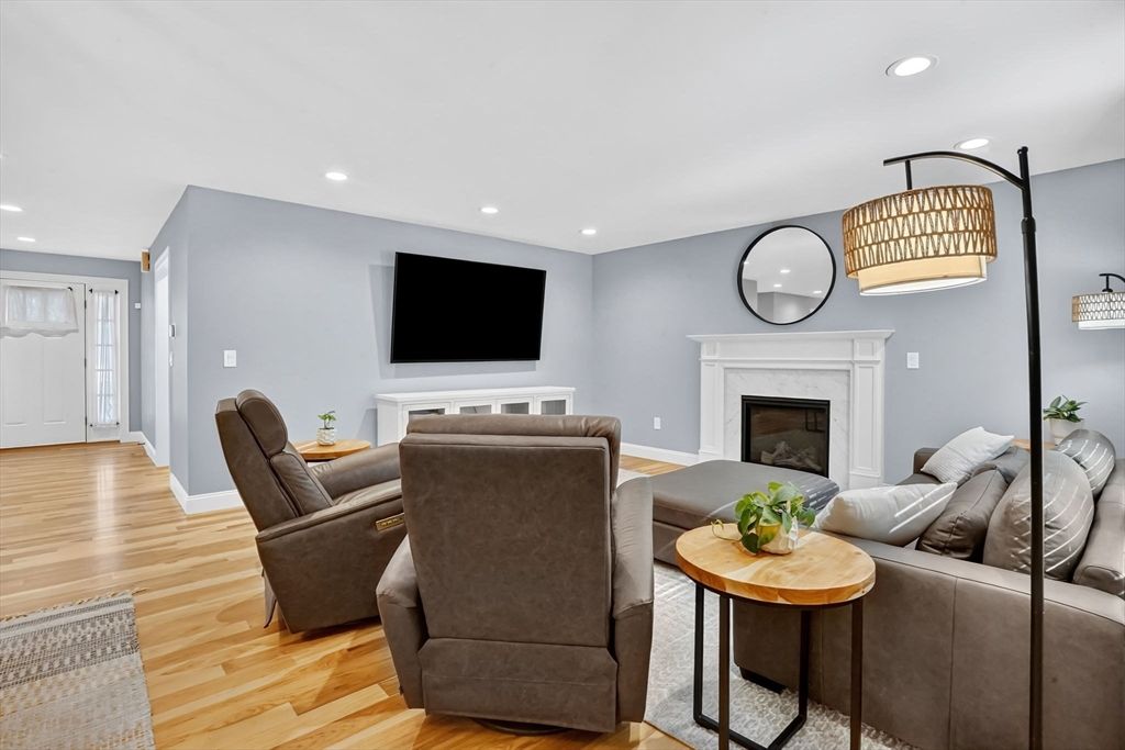 Fireplace, Interior, Living room, Recessed Lighting, Wood Texture Flooring