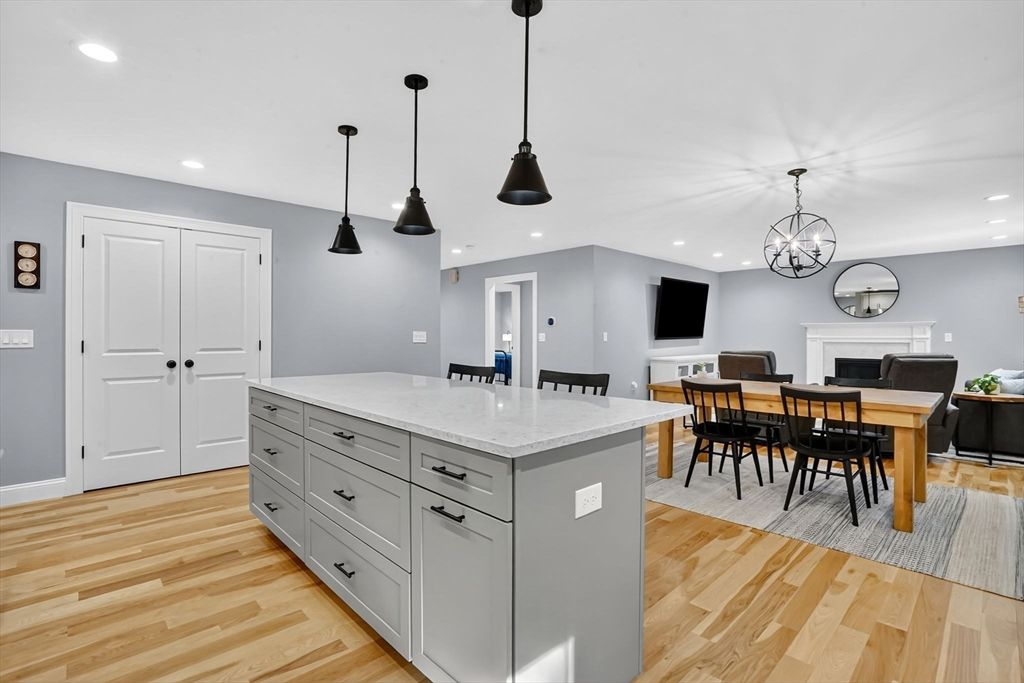 Dining room, Fireplace, Interior, Kitchen, Pendant Lights, Recessed Lighting, Wood Texture Flooring