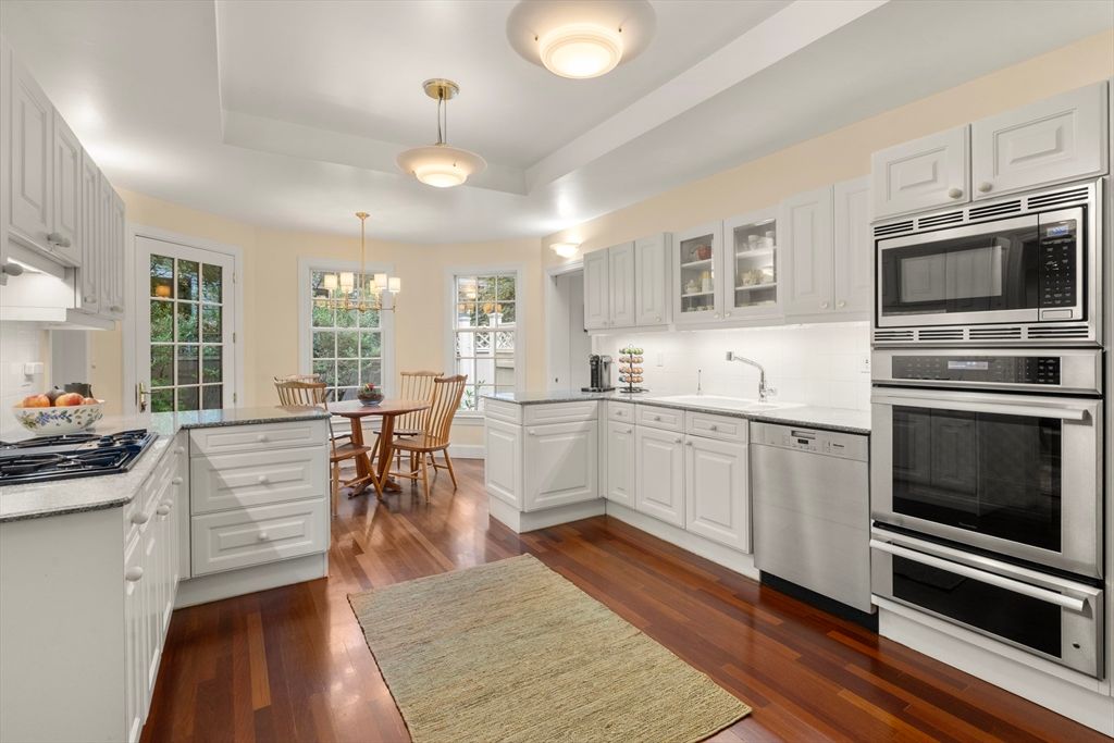 Chandelier, Dining room, Interior, Kitchen, Pendant Lights, Stainless Steel Appliances, Wood Texture Flooring
