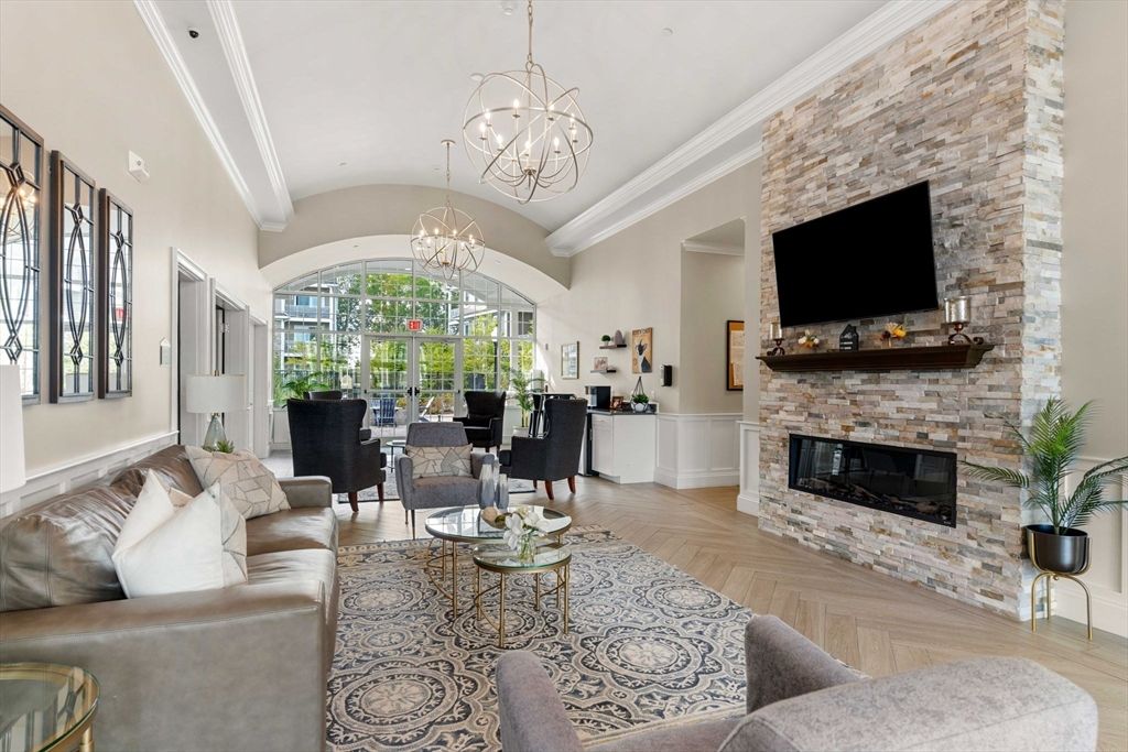 Chandelier, Dining room, Fireplace, Interior, Living room, Pendant Lights, Stone Walls, Wood Texture Flooring