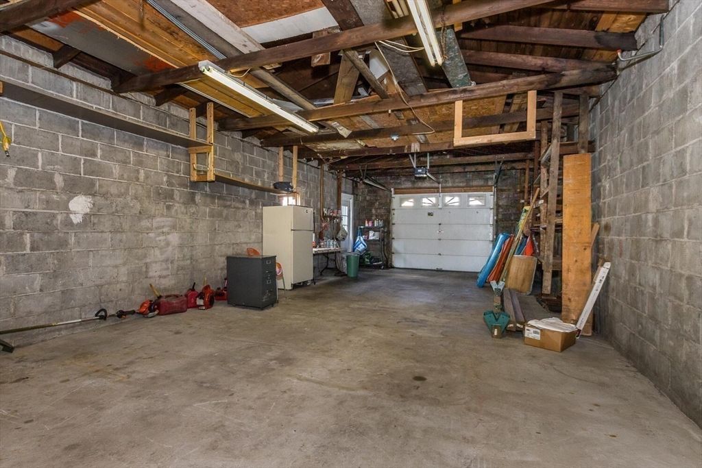 Garage, Interior, Stone Walls, Wooden Beams