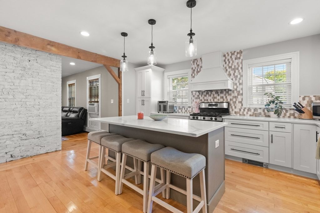 Interior, Kitchen, Pendant Lights, Recessed Lighting, Stainless Steel Appliances, Stone Walls, Wooden Beams, Wood Texture Flooring