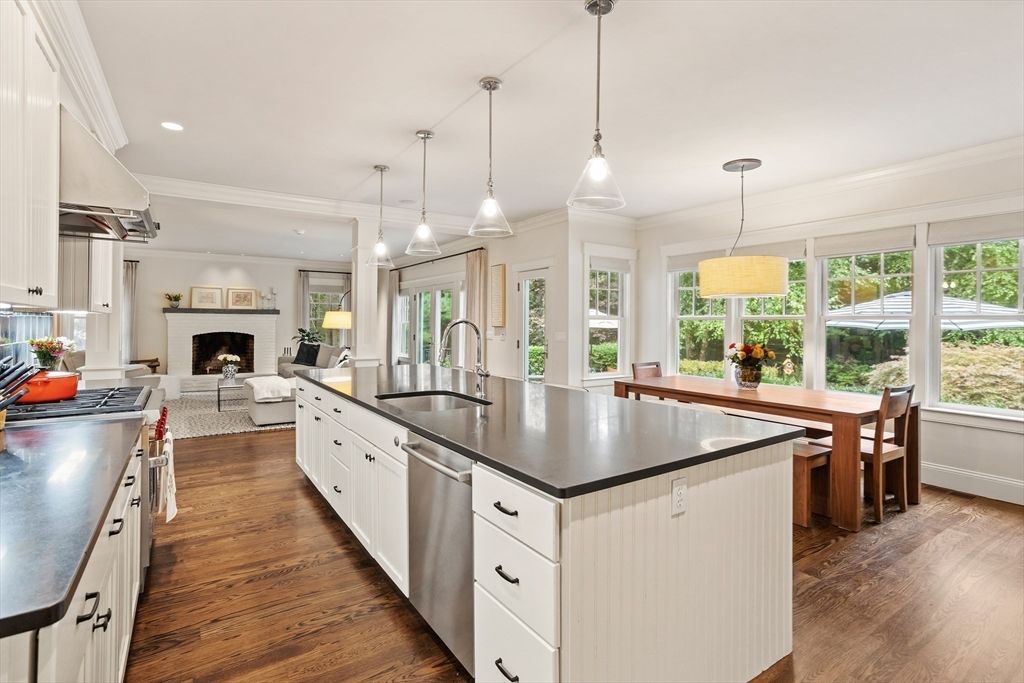 Dining room, Fireplace, Interior, Kitchen, Living room, Pendant Lights, Recessed Lighting, Stainless Steel Appliances, Wood Texture Flooring