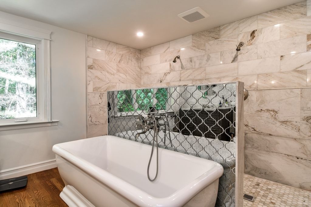 Bathroom, Free Standing Baths, Interior, Marble Walls, Recessed Lighting, Wood Texture Flooring