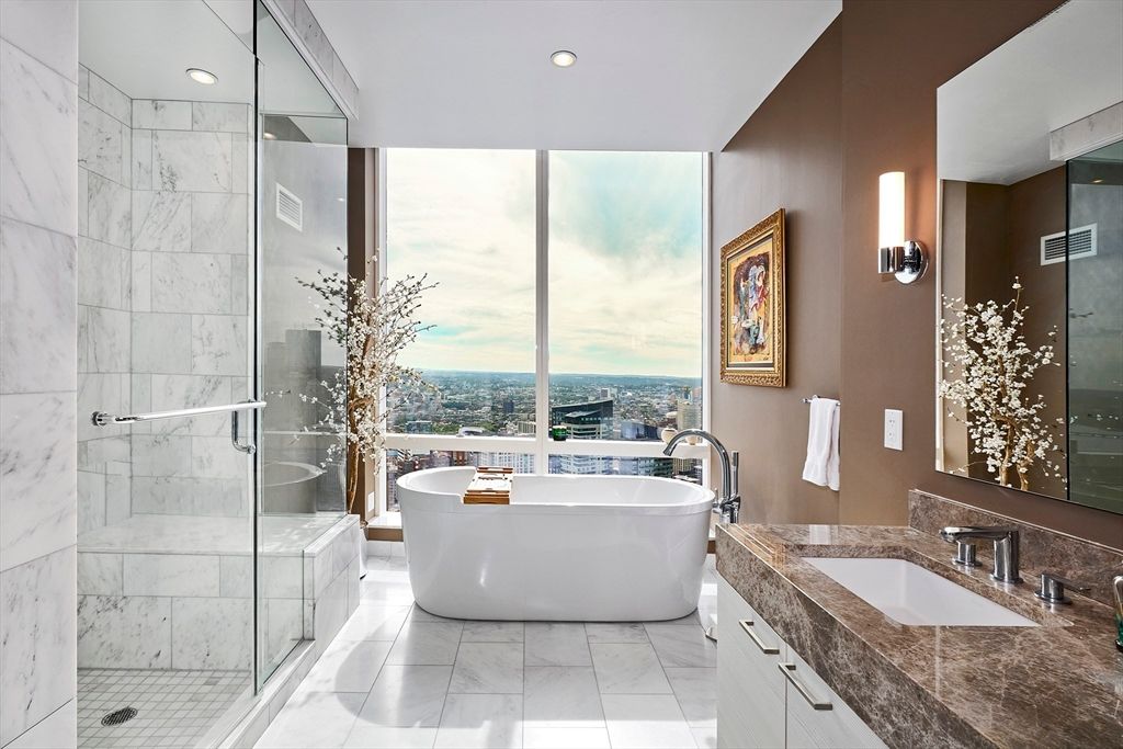Bathroom, Dual Sink Vanities, Free Standing Baths, Glass Shower, Interior, Marble, Marble Walls, Recessed Lighting