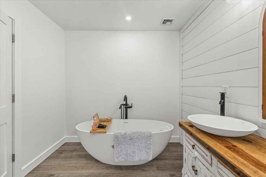 Bathroom, Free Standing Baths, Interior, Recessed Lighting, Wood Texture Flooring