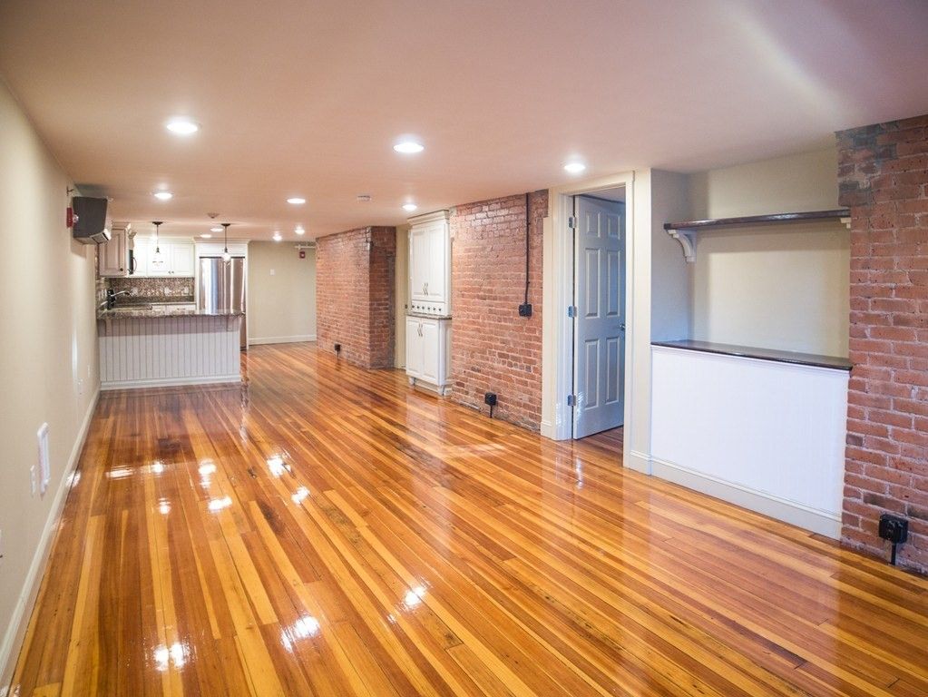 Empty room, Interior, Kitchen, Recessed Lighting, Stone Walls, Wood Texture Flooring