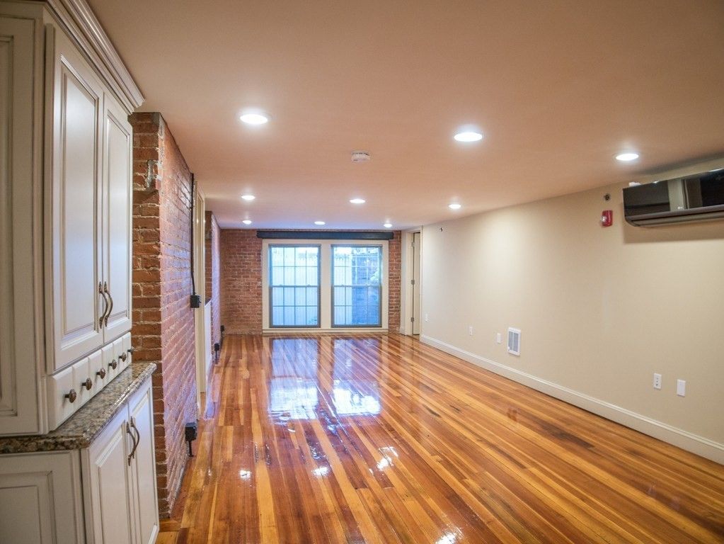 Empty room, Interior, Recessed Lighting, Stone Walls, Wood Texture Flooring