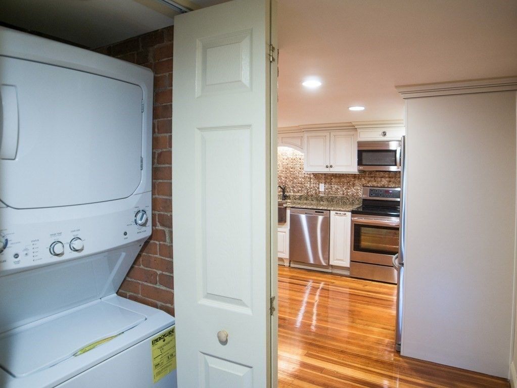 Interior, Kitchen, Recessed Lighting, Stainless Steel Appliances, Utility Closets, Washer, Wood Texture Flooring