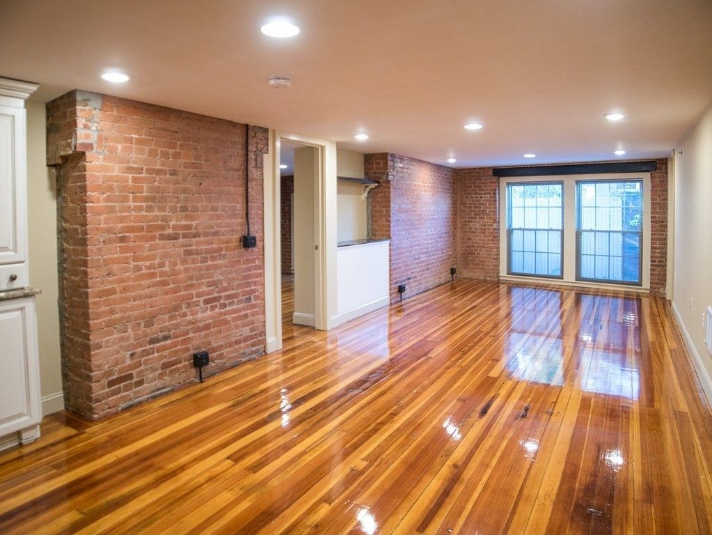 Empty room, Interior, Recessed Lighting, Stone Walls, Wood Texture Flooring