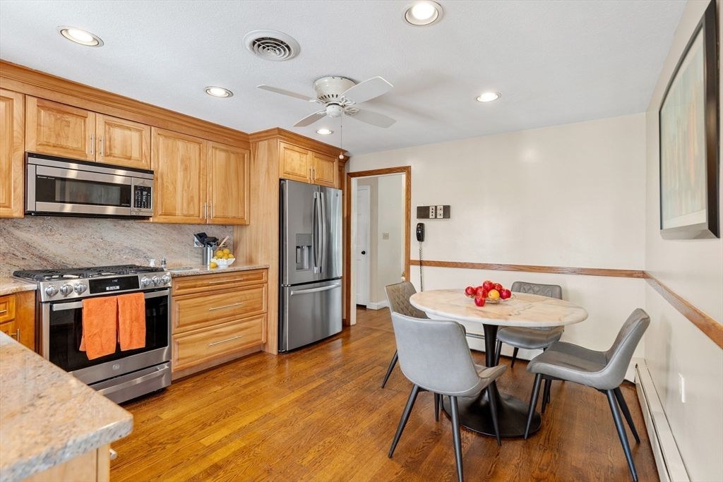 Dining room, Interior, Kitchen, Recessed Lighting, Stainless Steel Appliances, Wood Texture Flooring