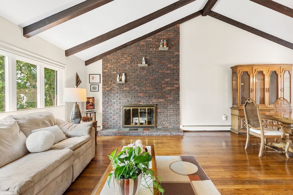 Dining room, Fireplace, Interior, Living room, Stone Walls, Wooden Beams, Wood Texture Flooring