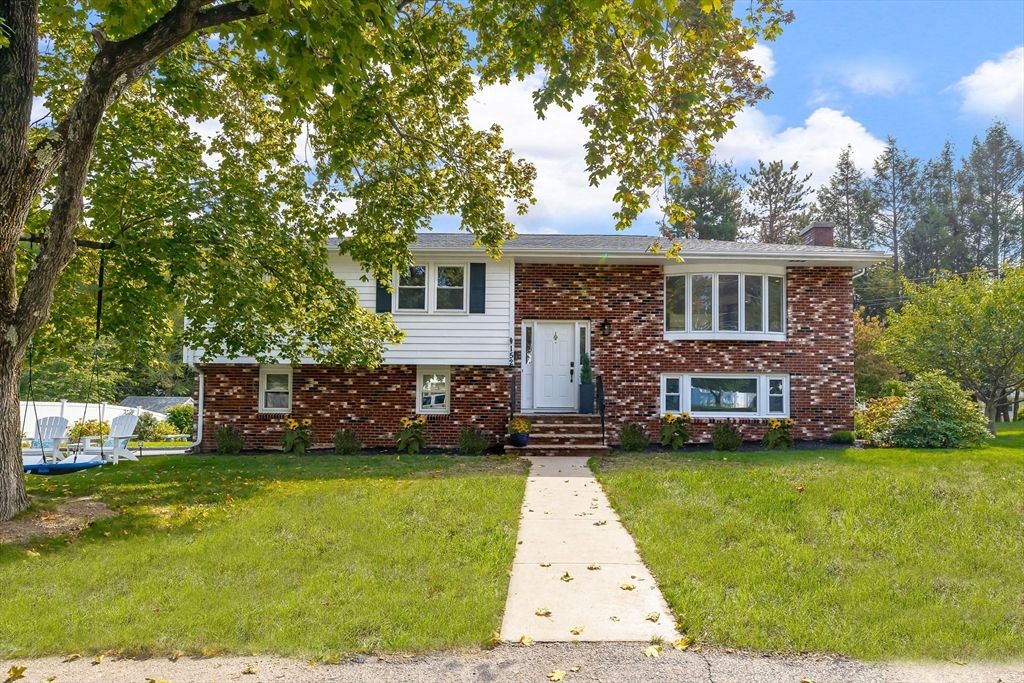 Exterior, Facade, Brick Facade, Raised Ranch