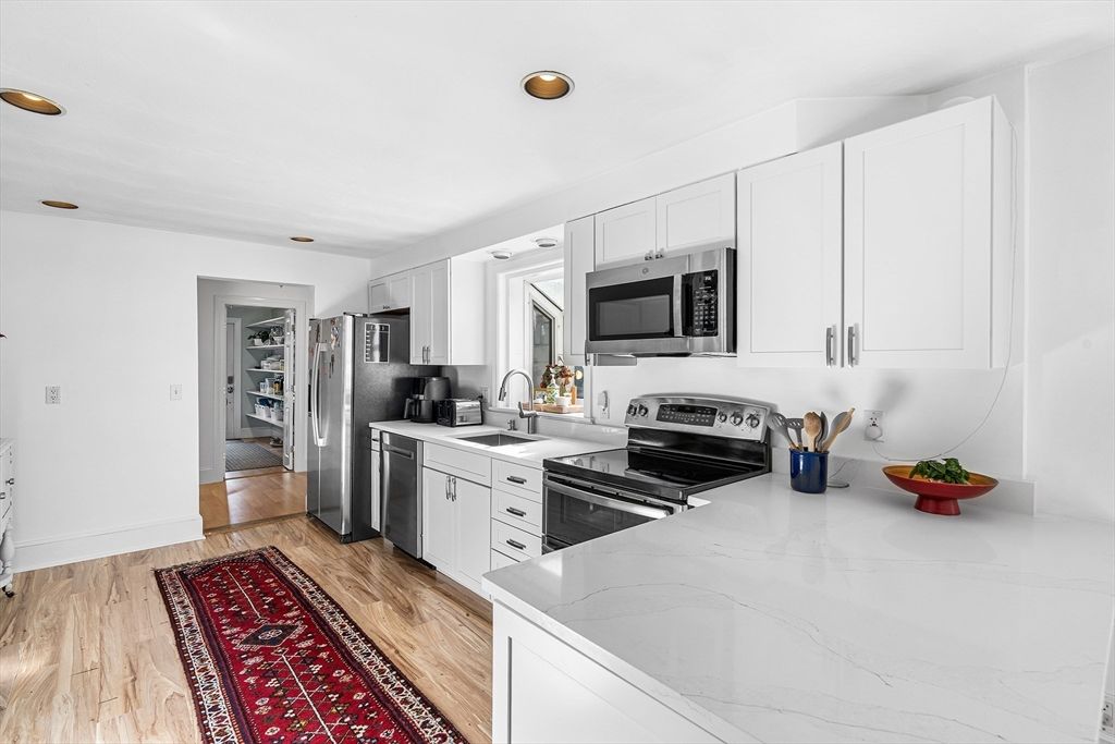 Interior, Kitchen, Recessed Lighting, Stainless Steel Appliances, Wood Texture Flooring
