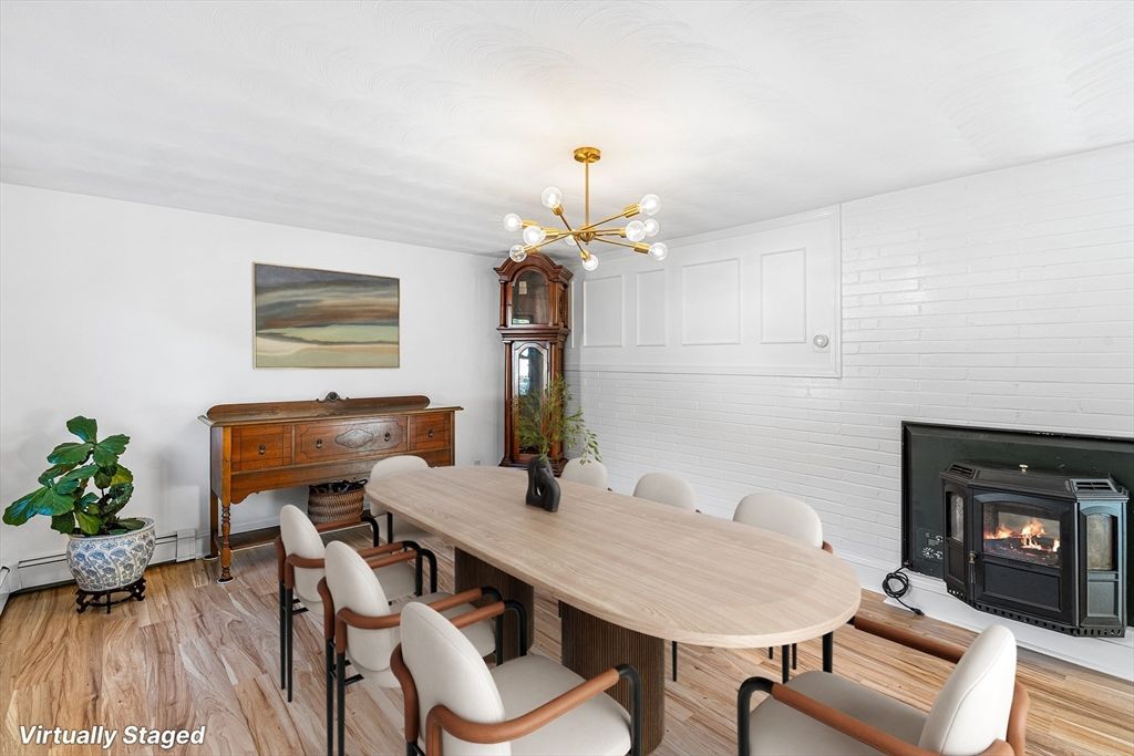 Dining room, Fireplace, Interior, Pendant Lights, Wood Texture Flooring