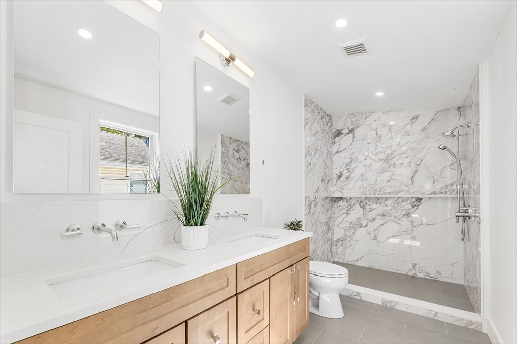 Bathroom, Dual Sink Vanities, Glass Shower, Interior, Marble Walls, Recessed Lighting