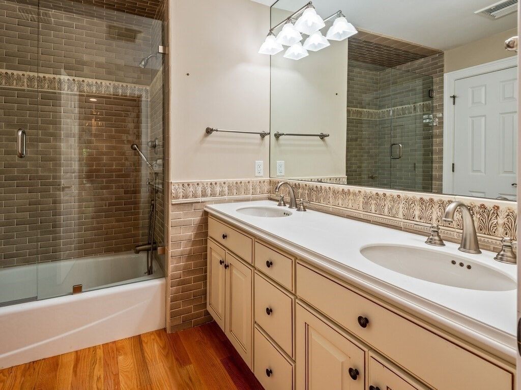 Bathroom, Dual Sink Vanities, Glass Shower, Interior, Wood Texture Flooring