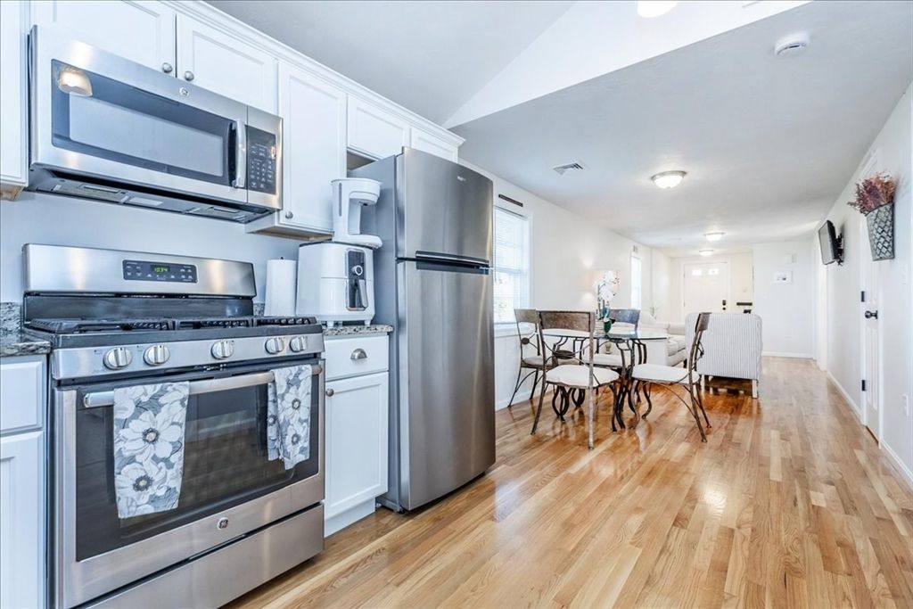 Dining room, Interior, Kitchen, Recessed Lighting, Stainless Steel Appliances, Wood Texture Flooring