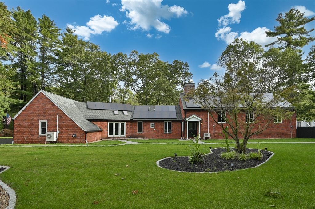 Backyard, Exterior, Facade, Brick Facade, Solar Panels, Tudor Revival